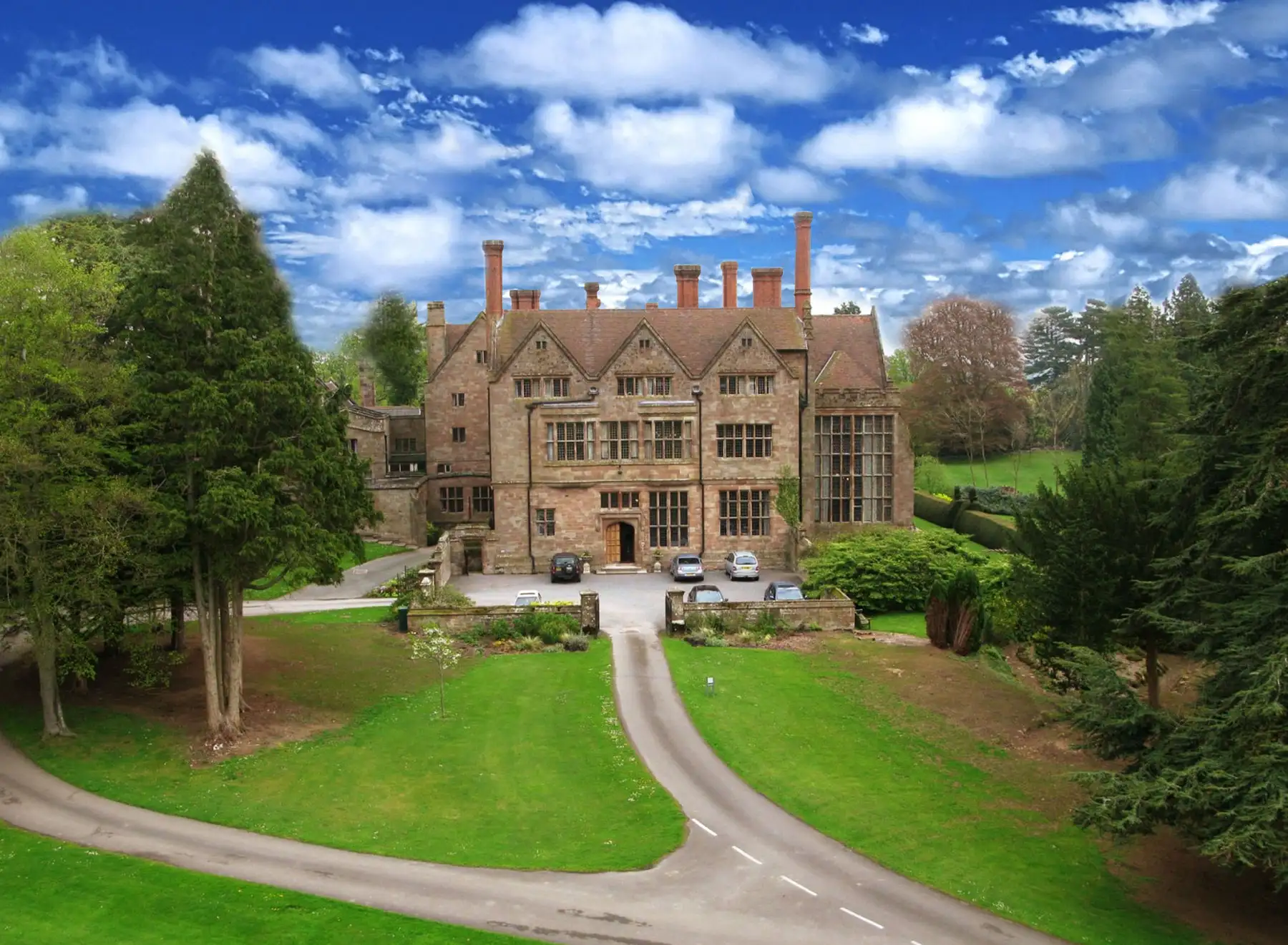 Adcote Hall entrance and historic stone gate in Shropshire