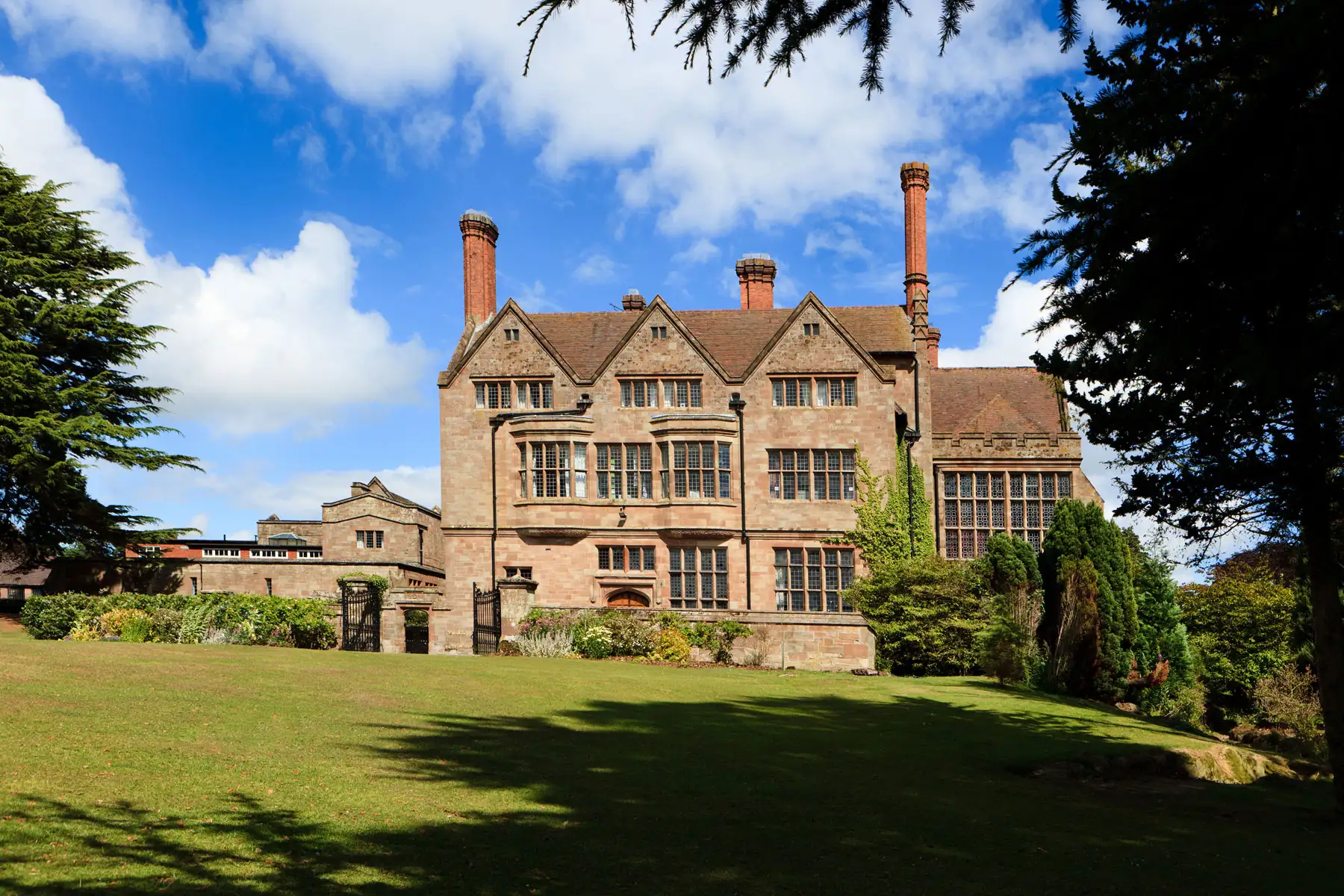 Adcote Hall garden and historic manor exterior